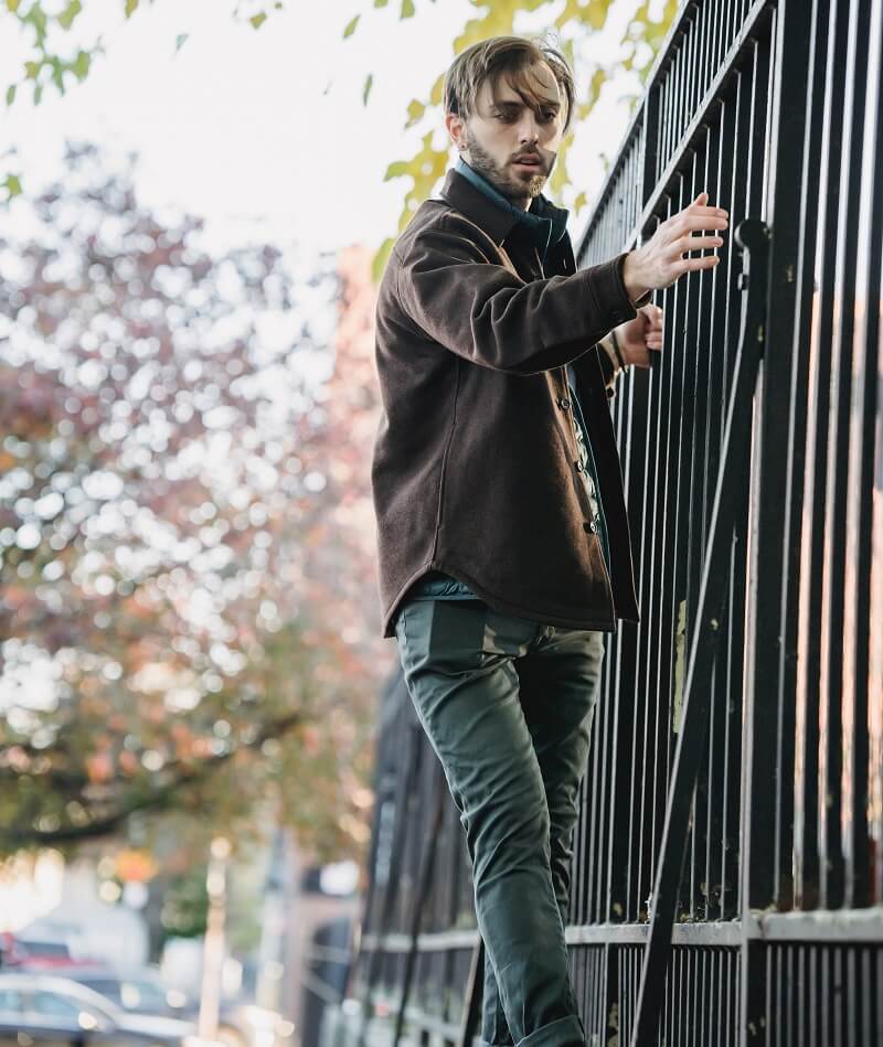 one men Wearing a black denim jacket with black denim jeans